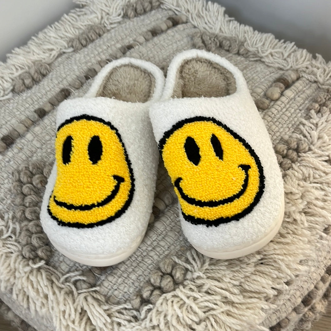 Yellow smiley slippers